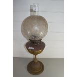 EARLY 20TH CENTURY OIL LAMP WITH FROSTED GLASS SHADE AND BRASS BODY