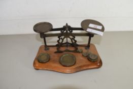 VINTAGE BRASS POSTAL SCALES AND WEIGHTS ON POLISHED WOODEN STAND