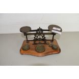 VINTAGE BRASS POSTAL SCALES AND WEIGHTS ON POLISHED WOODEN STAND