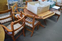 YEW WOOD TWIN PEDESTAL EXTENDING DINING TABLE AND SIX ACCOMPANYING CHAIRS