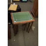 NEST OF THREE GLASS TOPPED OCCASIONAL TABLES, LARGEST 55CM WIDE