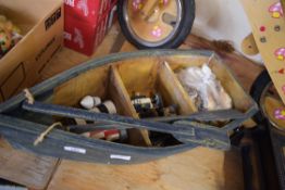 BOAT SHAPED SHELF UNIT CONTAINING VARIOUS SAILOR ORNAMENTS, SEA SHELLS ETC