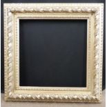 A modern bevelled edged rectangular picture frame. Approx 25x34inches.