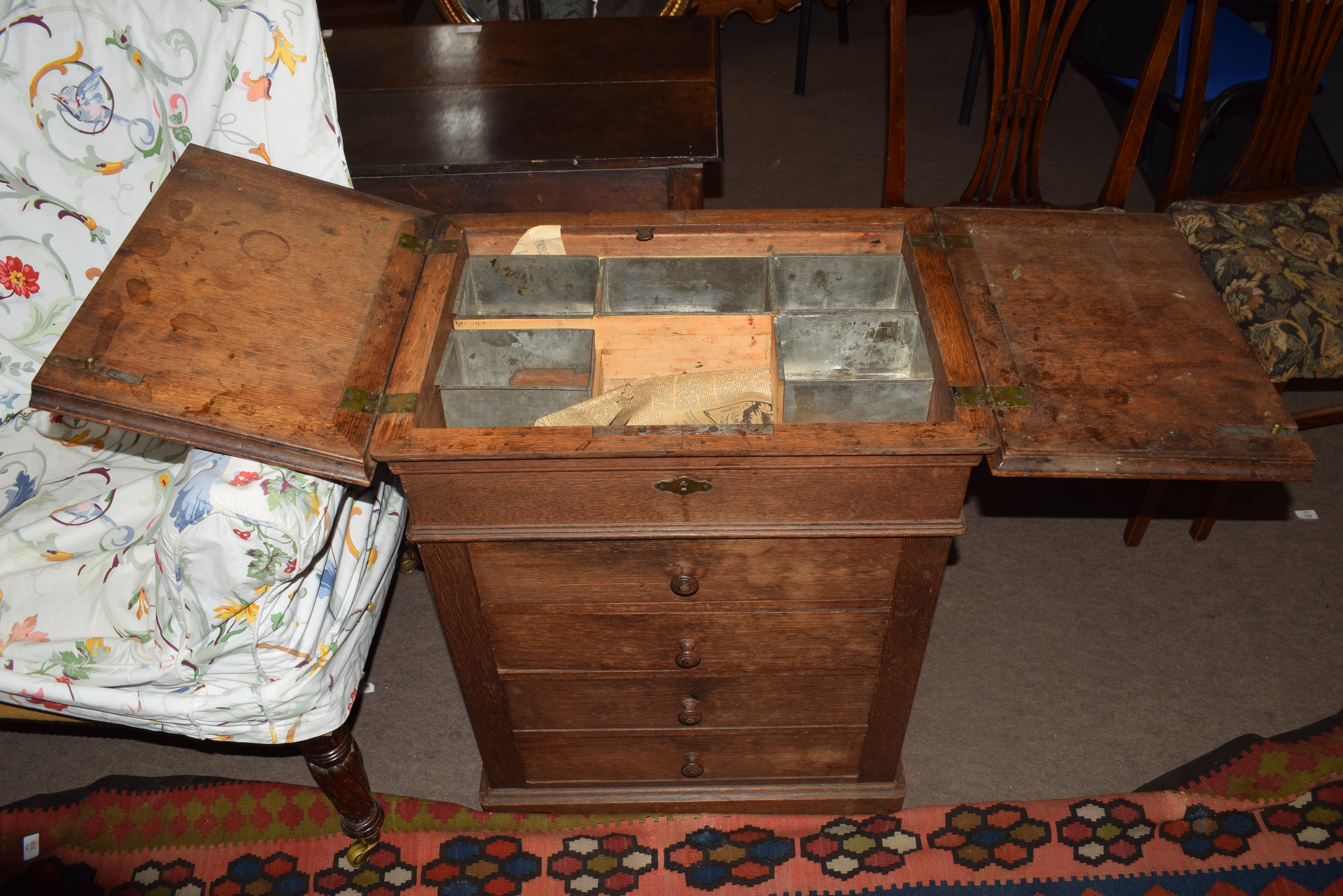 Late 19th century oak shop cabinet with fold-up lid opening to reveal an area containing mixing tub, - Image 2 of 2
