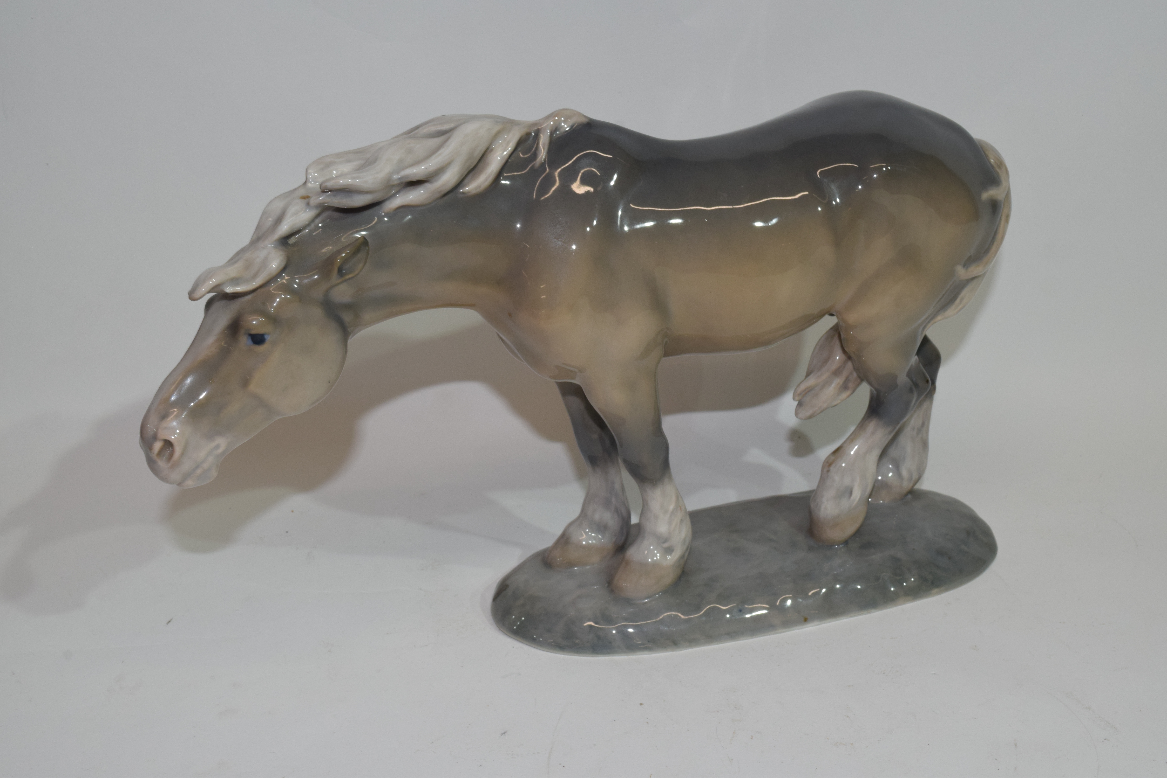 Large Royal Copenhagen model of a horse with monogram to base and dated 1912, model no 1362