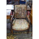 19th century mahogany framed armchair with tapering legs raised on casters, 92cm high