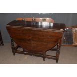 18th century oval oak gateleg table raised on turned legs, 120cm wide