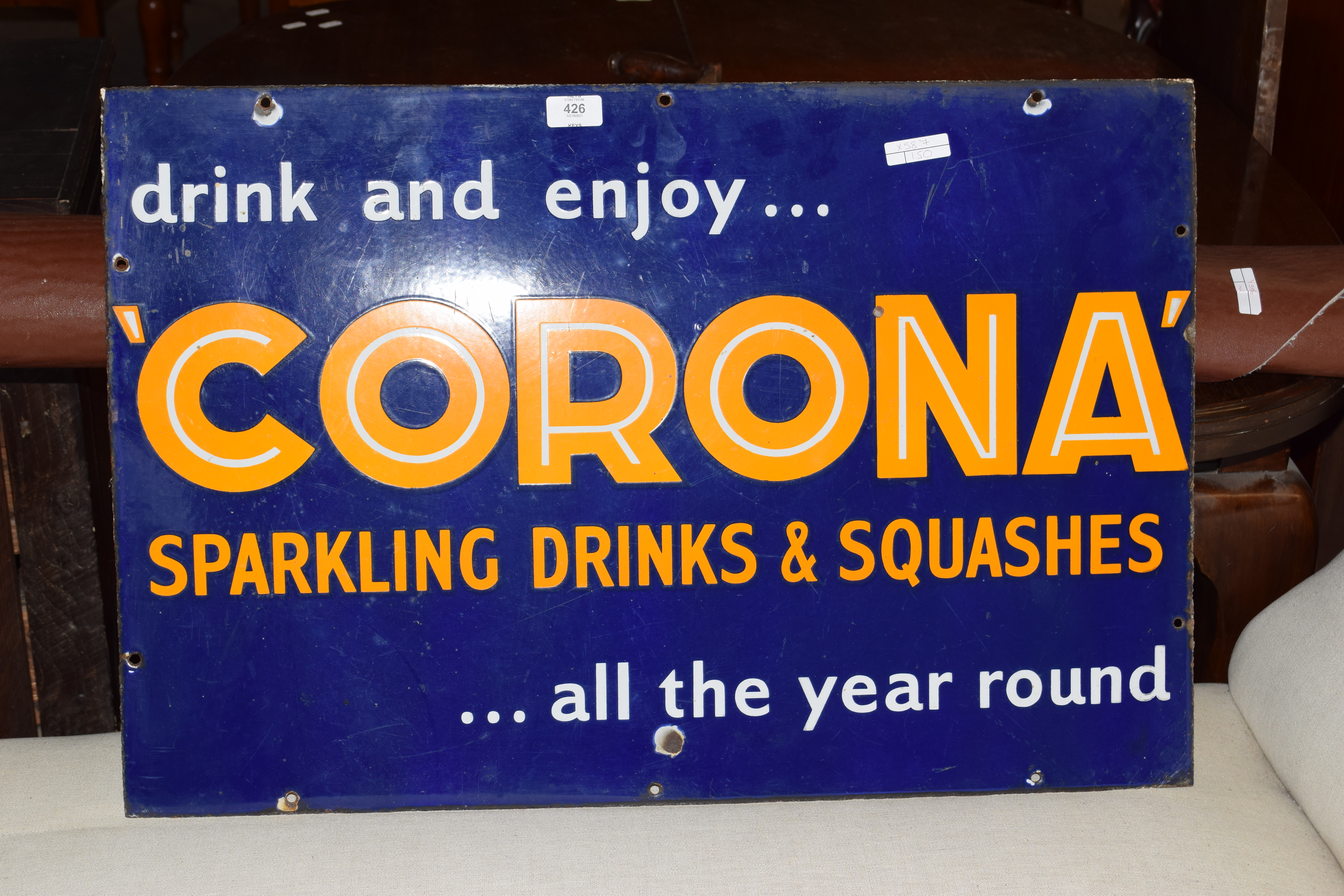 Vintage enamel advertising sign 'Corona sparkling drinks and squashes', 76cm wide