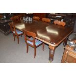 Late Victorian mahogany extending dining table raised on fluted legs and brass casters, 237cm wide