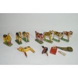 Collection of Indian painted wooden animal figures to include tigers, horses, peacocks, elephants
