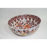 Chinese porcelain bowl with an iron red design of flowers, 25cm diam