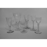 Collection of glass wares including a large air twist ale glass with engraving fruiting vine