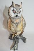 Kaiser porcelain model of an owl standing on a tree stump, 22cm high