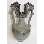 Large high-fired Oriental bowl with handles shaped as dragons, 33cm high