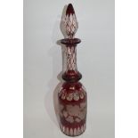 Bohemian style glass decanter and tear drop stopper, the decanter with a design of fruiting vine and