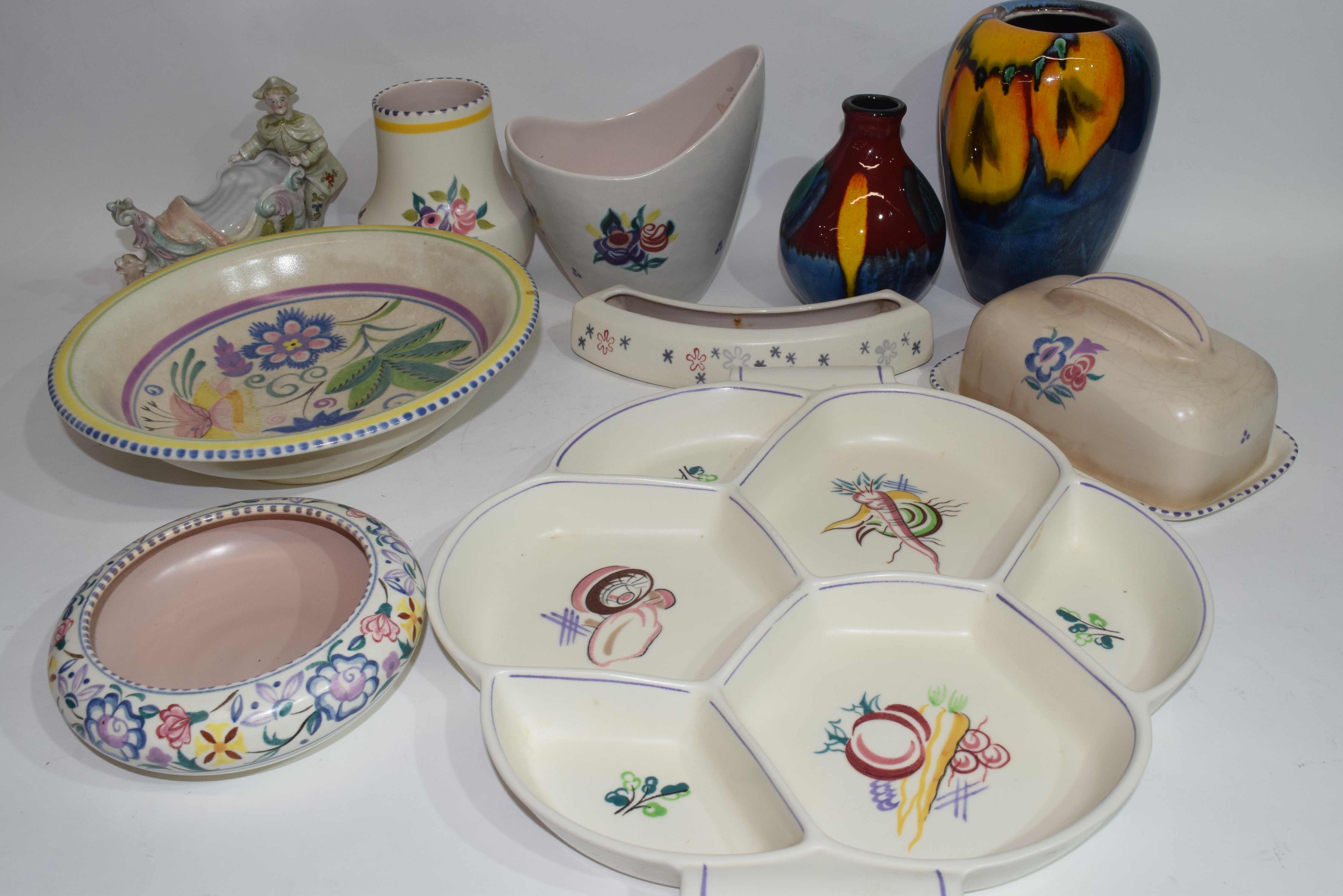 Group of mainly Poole wares with floral designs including two vases from the high fired Delphis