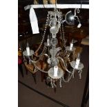 Contemporary five-light chandelier set with clear prismatic glass drops, approx 75cm high