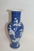 Chinese porcelain vase of baluster shape, the blue ground decorated with prunus with Chinese marks