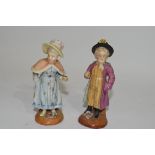 Pair of Continental porcelain figures of a boy and a girl with blue AR mark to base