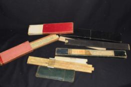 Collection of slide rules and other items to include Unique Universal 2 slide rule, Unique Universal