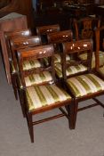 Set of six 19th century mahogany bar back dining chairs with striped upholstered seats, tapering
