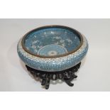 Chinese cloisonne bowl, the blue ground with geometric white floral design, 20cm diam