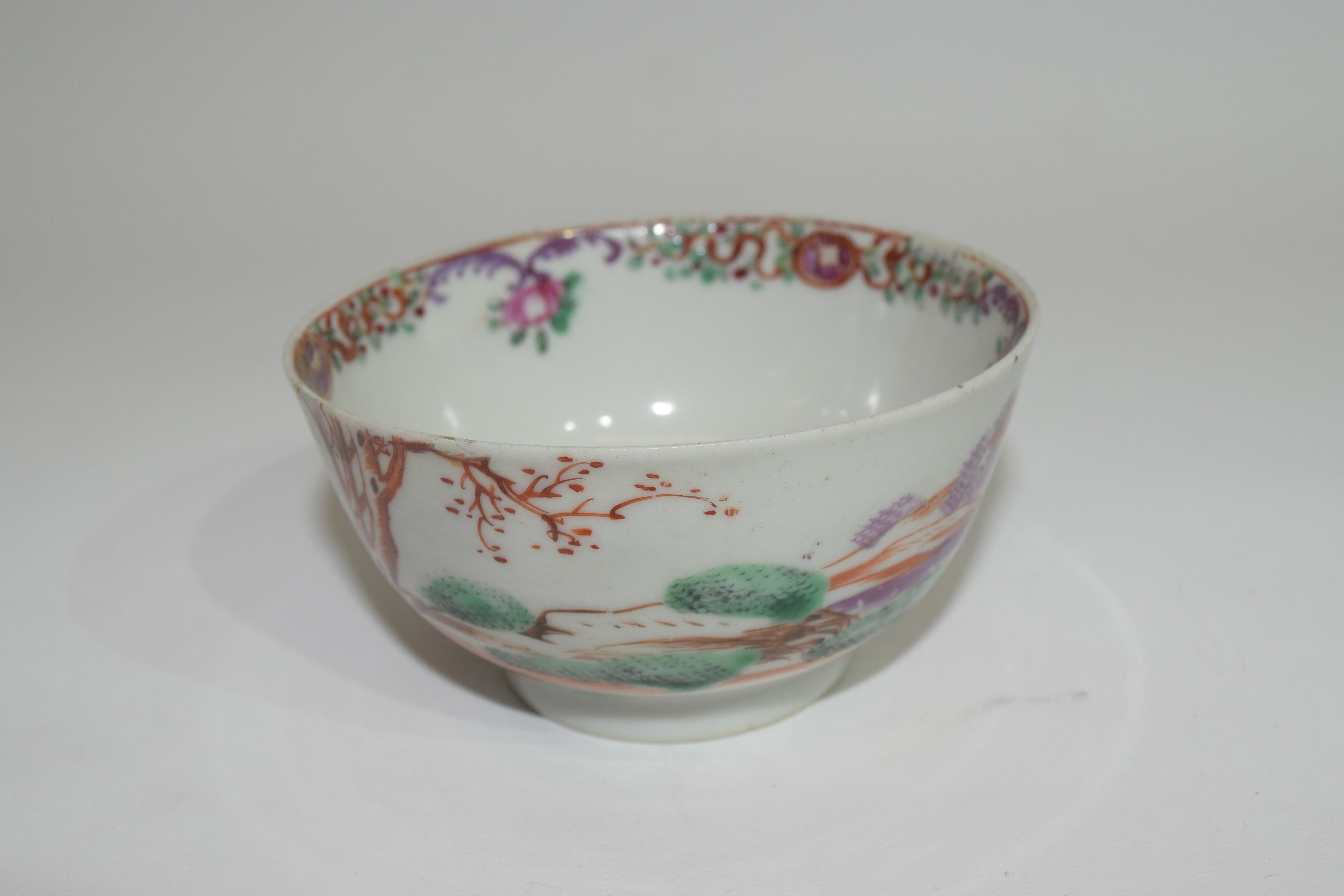 Small Chinese bowl, 18th century, with polychrome design of horses in a landscape, 9cm diam (rim - Image 2 of 3
