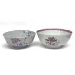Two 18th century Chinese export porcelain bowls with floral designs, the largest 26cm diam (2)