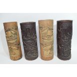 Group of four Chinese bamboo brush pots with various typical carvings of Chinese characters and