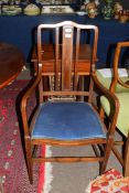 Mahogany armchair with strung decoration throughout, width approx 53cm max