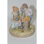 Small porcelain group of a girl and boy picking flowers on an oval base, Dresden mark to underside