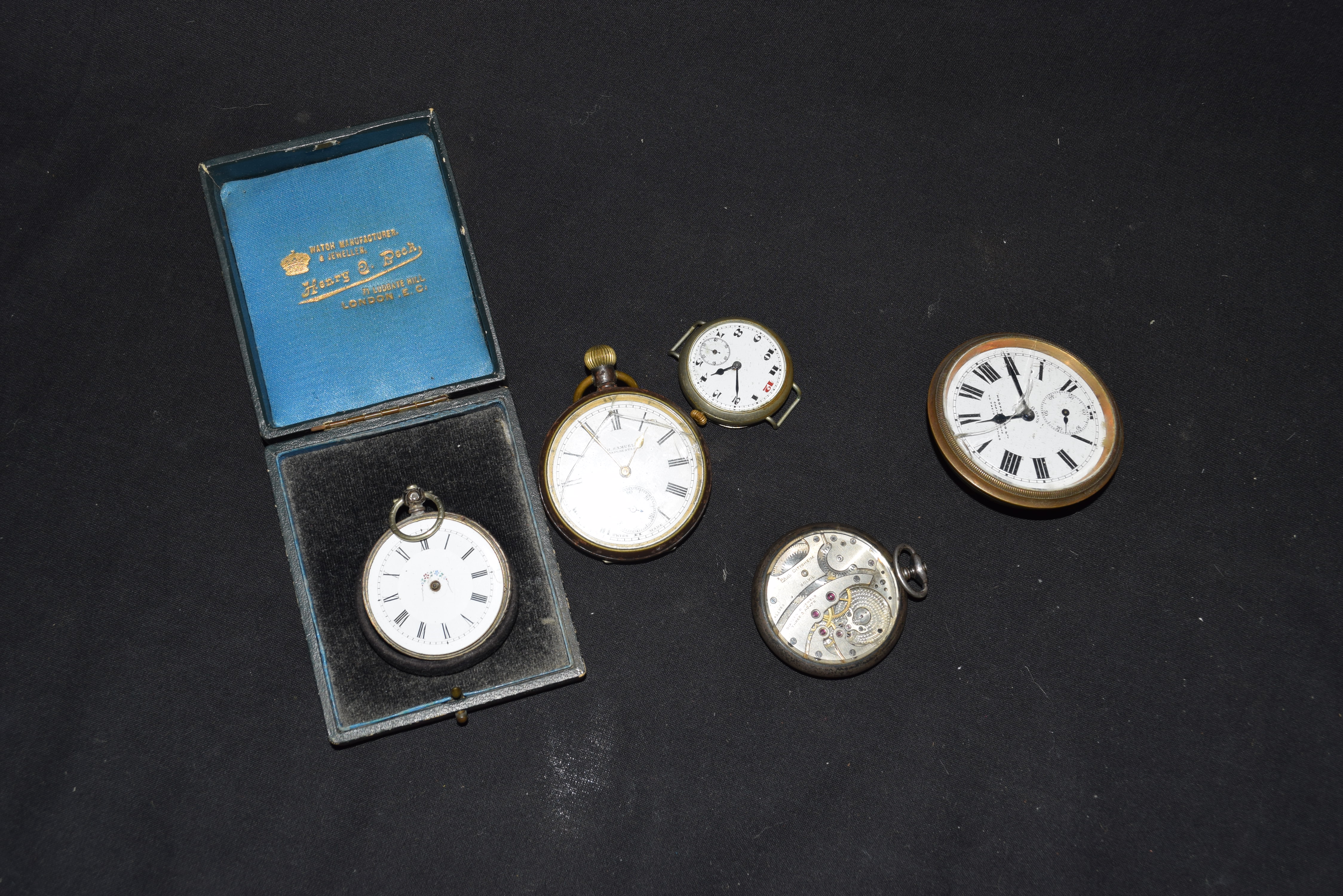 Mixed lot comprising a Continental ladies pocket watch (lacking hands) set in a 800 grade white