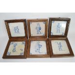 Set of six Dutch 18th century Delft tiles with various typical designs of figures, all in wooden