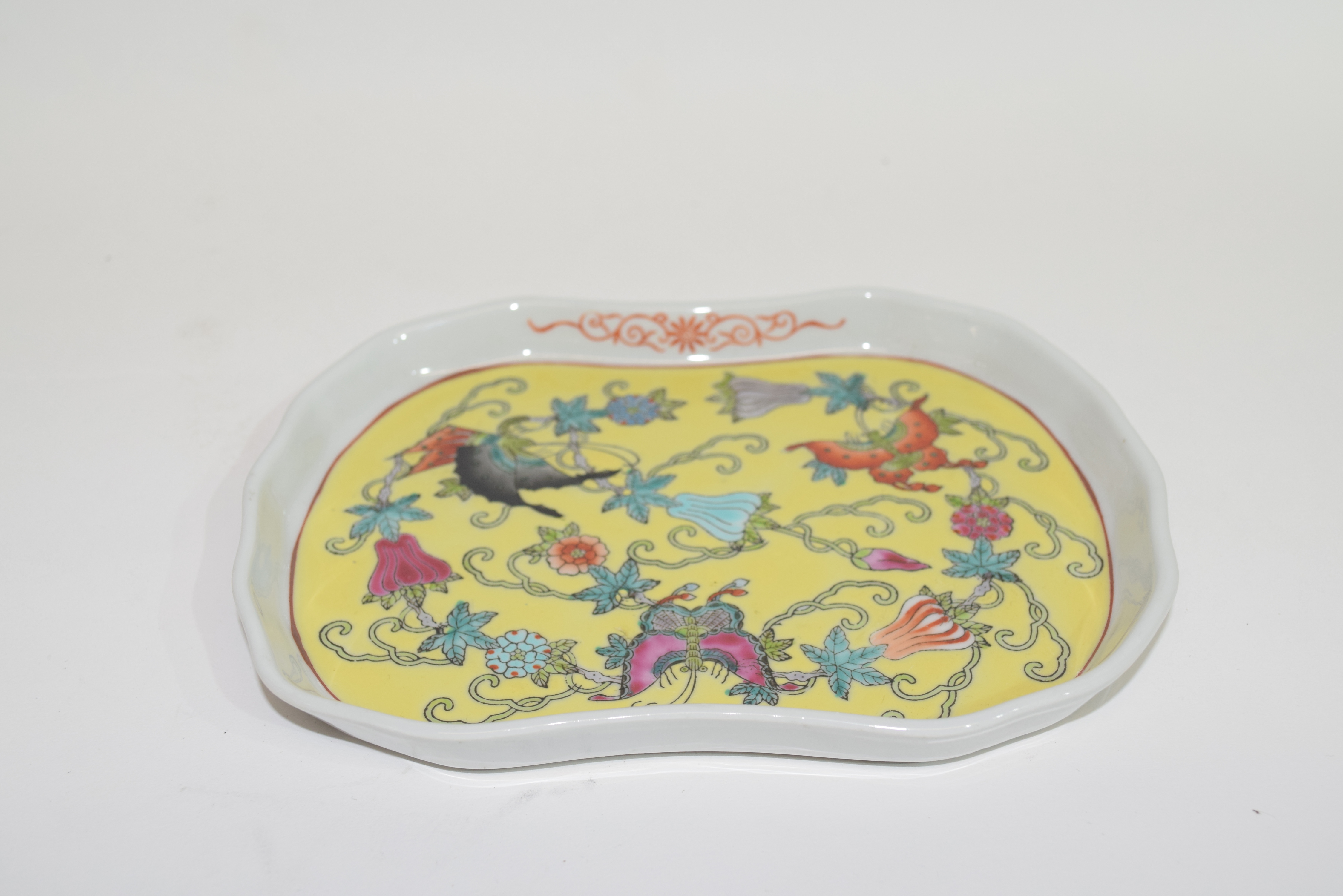 Small Chinese porcelain shaped dish, the yellow ground centre decorated with moss and butterflies, - Image 2 of 2