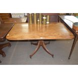 19th century mahogany pedestal dining table, the rectangular top over a turned column with quatre