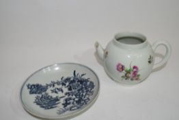 Worcester tea pot with flowers (a/f) and a Worcester fence pattern saucer (restored) (2)