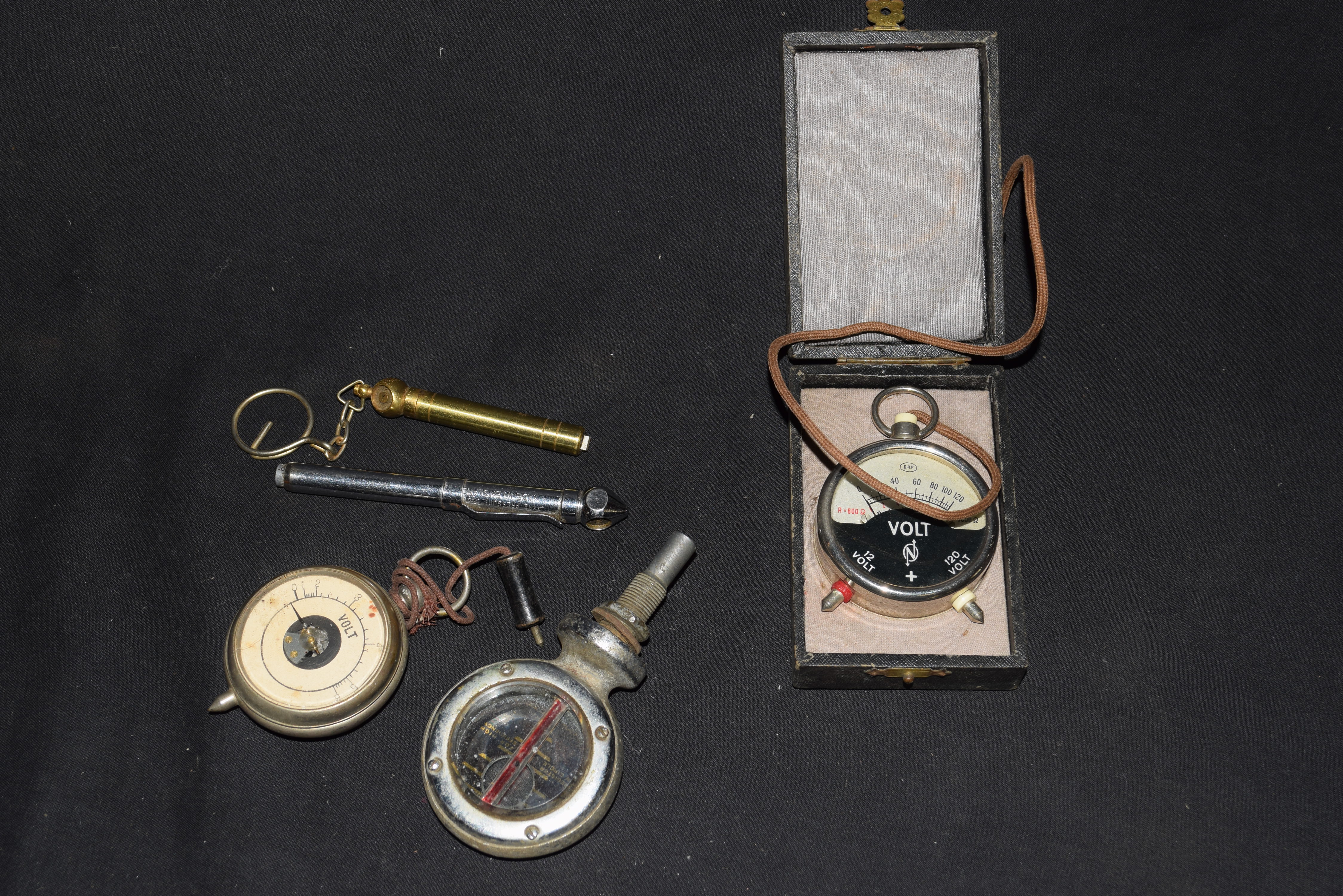Mixed lot comprising a Boyce Moto Meter, M model, together with a cased vintage voltmeter, a further