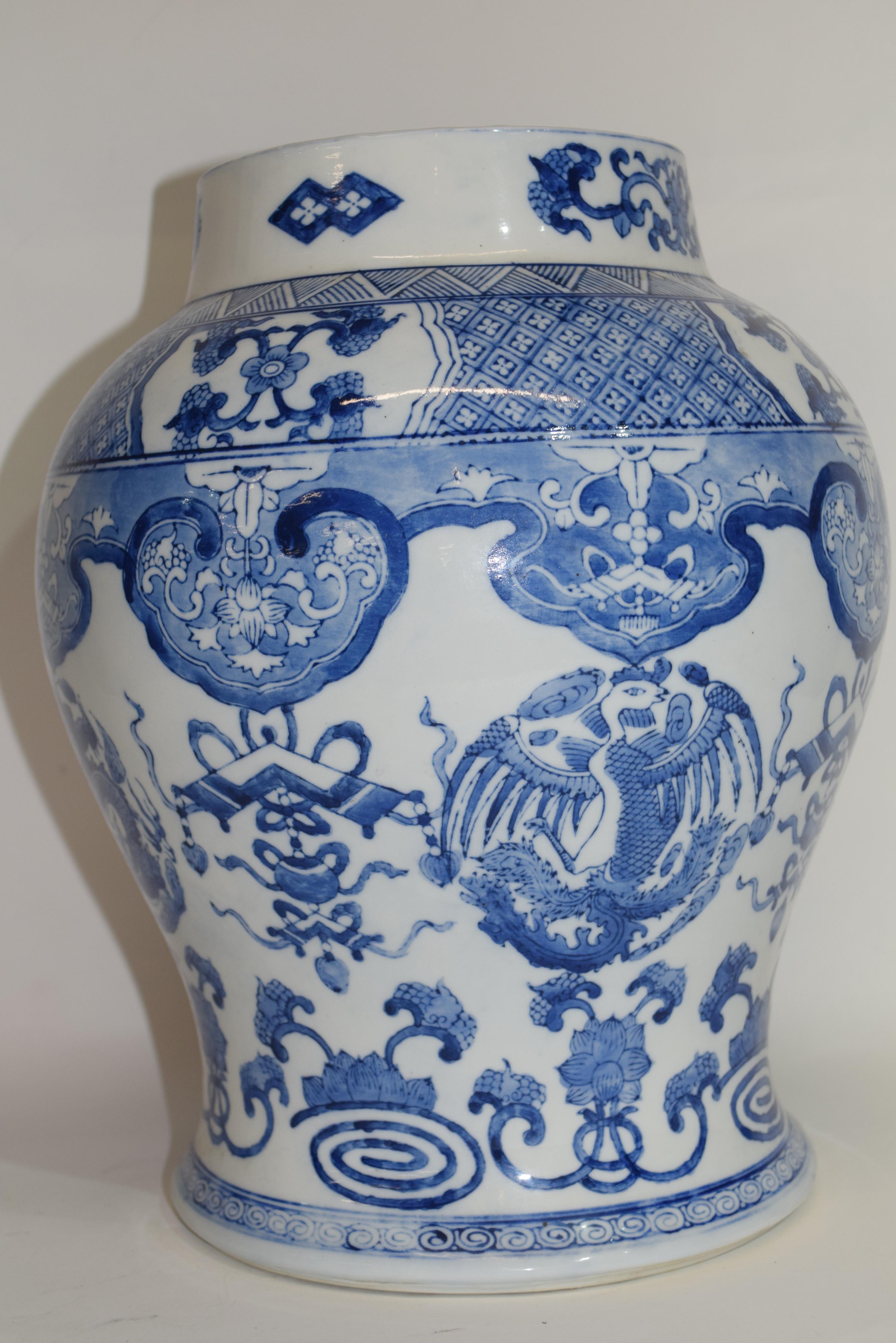 Large Chinese porcelain jar decorated with a blue and white design in Kangxi style, 33cm high - Image 2 of 2