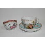 Continental porcelain cup and saucer decorated in Meissen style with panels of figures