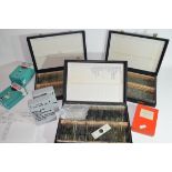 Collection of various microscope slides contained within three large black cases and eight various