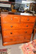 Victorian mahogany chest of two short over three long drawers fitted with turned knob handles and