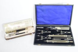 A cased technical drawing set, the dividers impressed WHH Ltd in original fitted case, together with