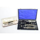 A cased technical drawing set, the dividers impressed WHH Ltd in original fitted case, together with