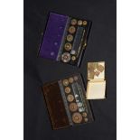 Griffin & Tatlock Bakelite cased set of chemists weights, together with a further similar set in