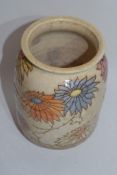 Unusual Bursley ware Charlotte Rhead vase, the ribbed body with floral design, 20cm high