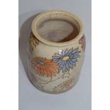 Unusual Bursley ware Charlotte Rhead vase, the ribbed body with floral design, 20cm high