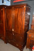 19th century mahogany wardrobe with moulded cornice over two panelled doors and single drawer