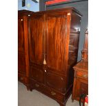19th century mahogany wardrobe with moulded cornice over two panelled doors and single drawer