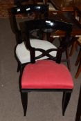 Pair of Regency style dining or side chairs with black painted frames and upholstered seats, 90cm