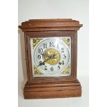 Early 20th century mantel clock, pressed metal dial to a brass movement striking on a coiled gong